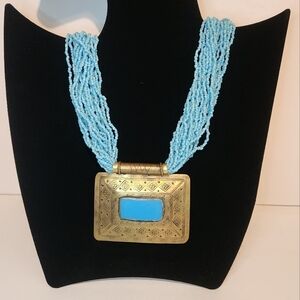 Multi-Strand Faux Turquoise Seed Bead w/ Lg. Goldtone Metal Rectangular Pendant